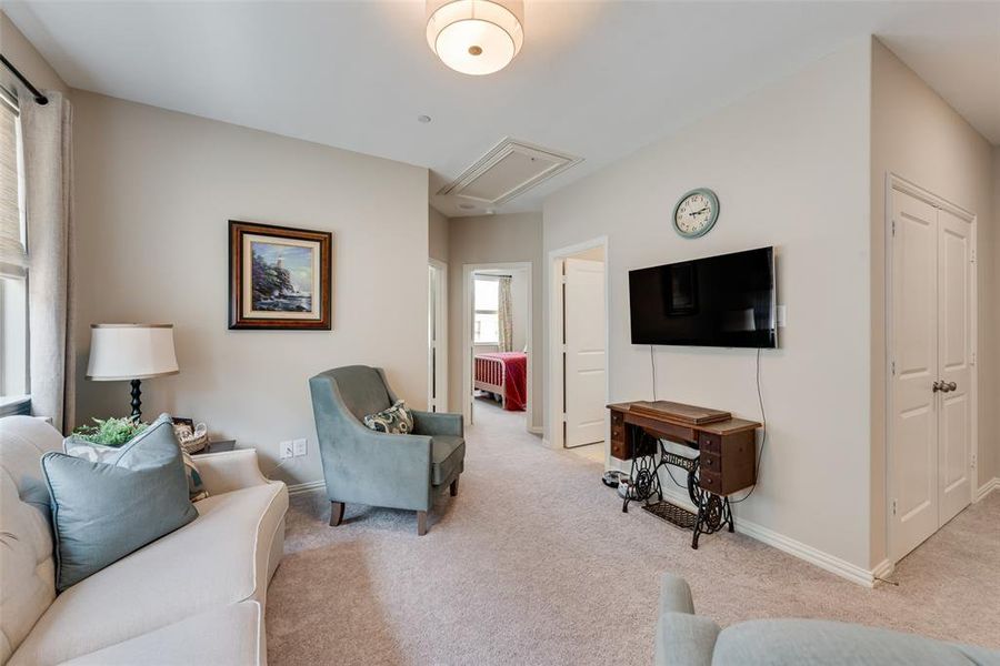 Carpeted interior with light-toned walls Carpeted interior with light-toned walls