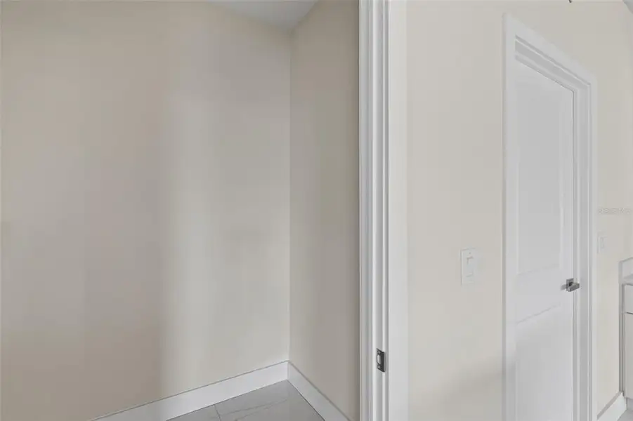 Spacious, unfurnished interior of a new home in , Port Charlotte (Image 16).