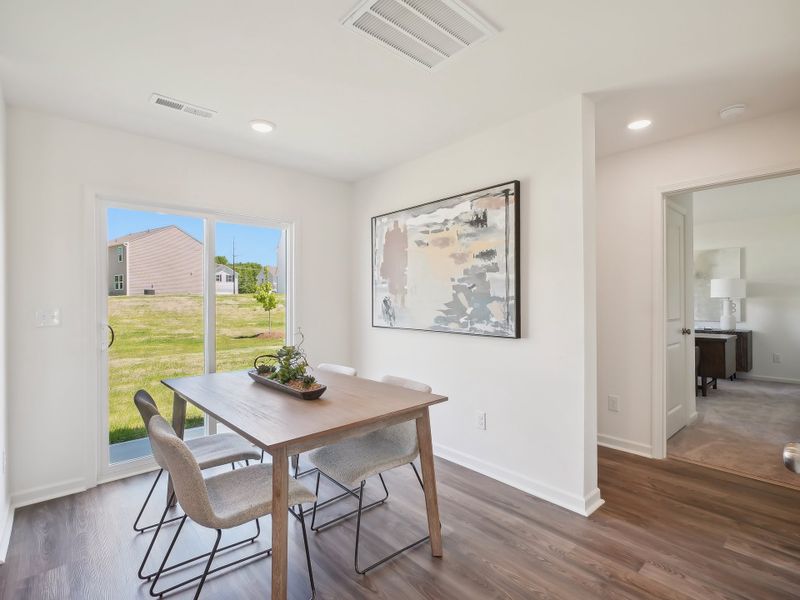 A dining room table with chairs. A dining room table with chairs.