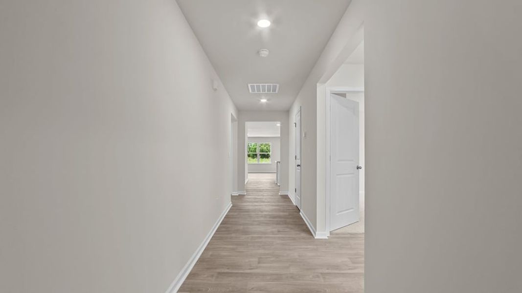Representative unfurnished interior of a home built from the Cali by D.R. Horton in Hobbs Farm, Ayden (Image 14).