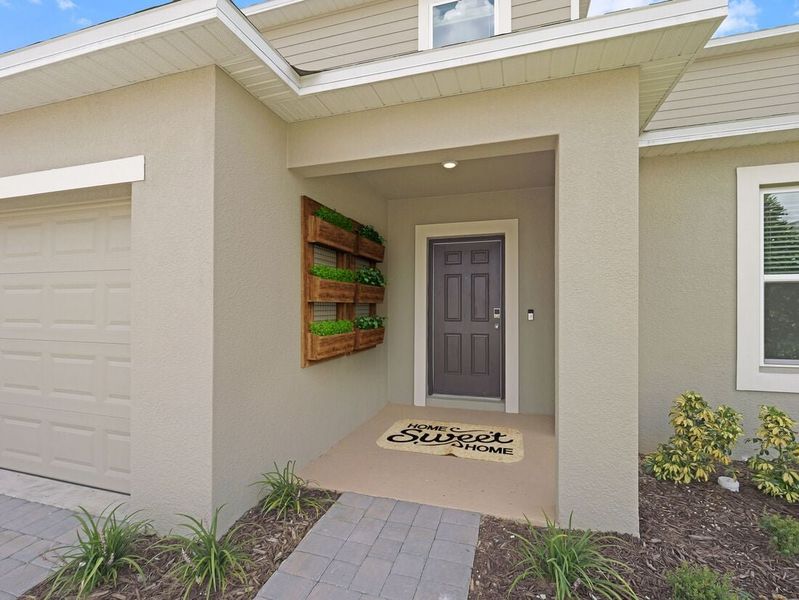 Representative exterior photo of a completed home built from the Azalea by Taylor Morrison in Scenic Terrace, Lake Hamilton, FL (Image 29).