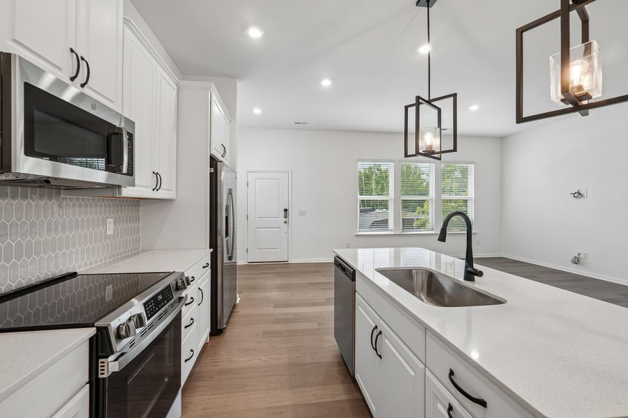 Furnished interior view inside a new home in Terraces at the Exchange, Indian Land (Image 9).