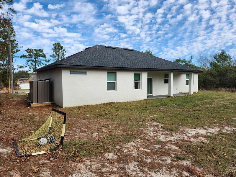 Exterior details and patio area of a home in , Ocala (Image 47).