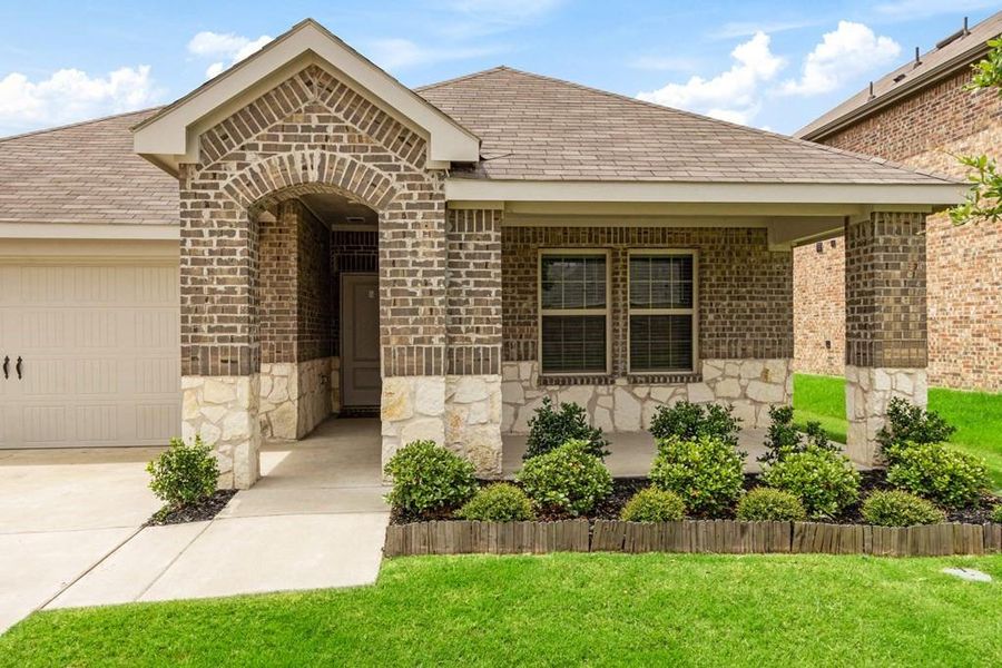 Front exterior of a new home in , Caddo Mills, TX, highlighting curb appeal (Image 22). Front exterior of a new home in , Caddo Mills, TX, highlighting curb appeal (Image 22).