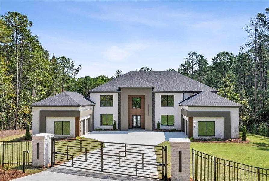 Front exterior of a new home in , Buford, GA, highlighting curb appeal (Image 2).