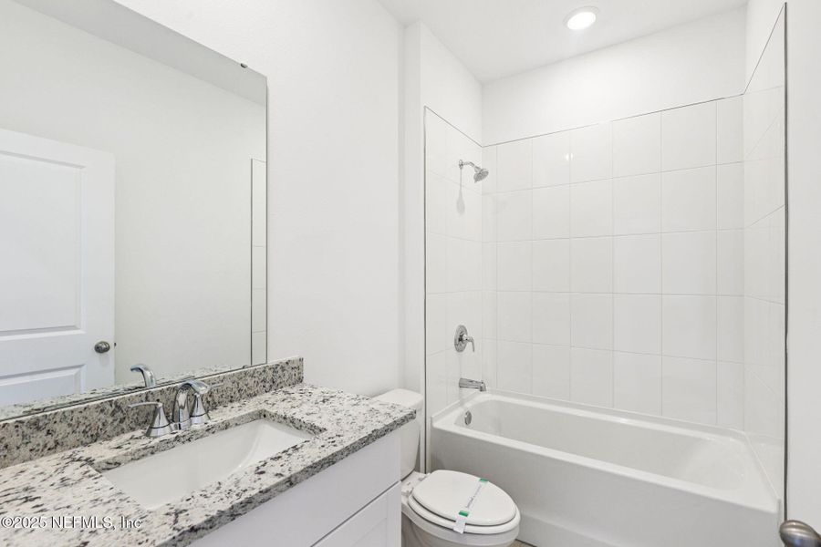 Furnished interior view inside a new home in Lakes at Bella Lago - Signature Series, Green Cove Springs (Image 8).