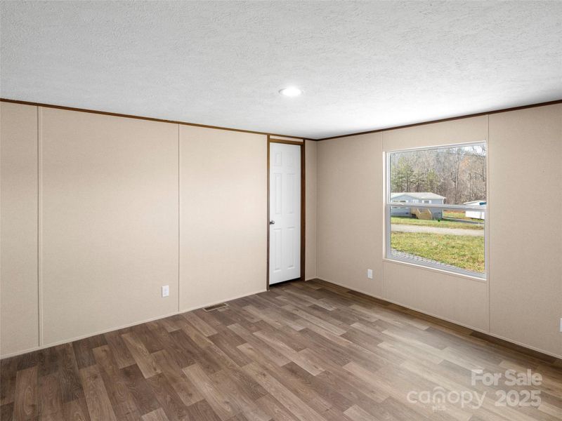 Spacious, unfurnished interior of a new home in , Old Fort (Image 17).