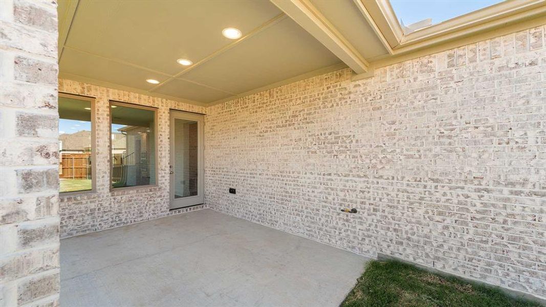 Exterior details and patio area of a home in The Parks At Wilson Creek 40', Celina (Image 3). Exterior details and patio area of a home in The Parks At Wilson Creek 40', Celina (Image 3).