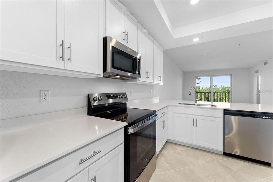 Furnished interior view inside a new home in Heritage Landing: Veranda Condominiums, Punta Gorda (Image 14).