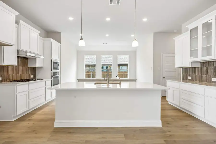 Furnished interior view inside a new home in Oaks of North Grove, Waxahachie (Image 7). Furnished interior view inside a new home in Oaks of North Grove, Waxahachie (Image 7).