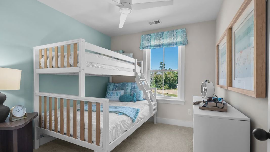 The Brookgreen secondary bedroom at Seabreeze blends comfort, function, and coastal charm. The Brookgreen secondary bedroom at Seabreeze blends comfort, function, and coastal charm.