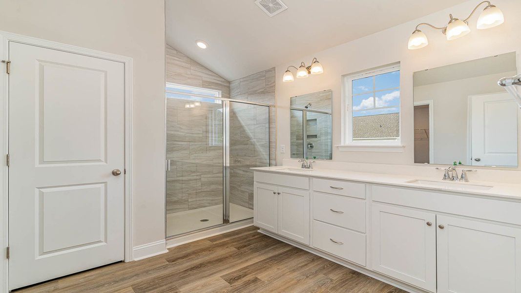 Representative furnished interior of a home built from the FORRESTER by D.R. Horton in Shell Pointe, Gilbert (Image 10).