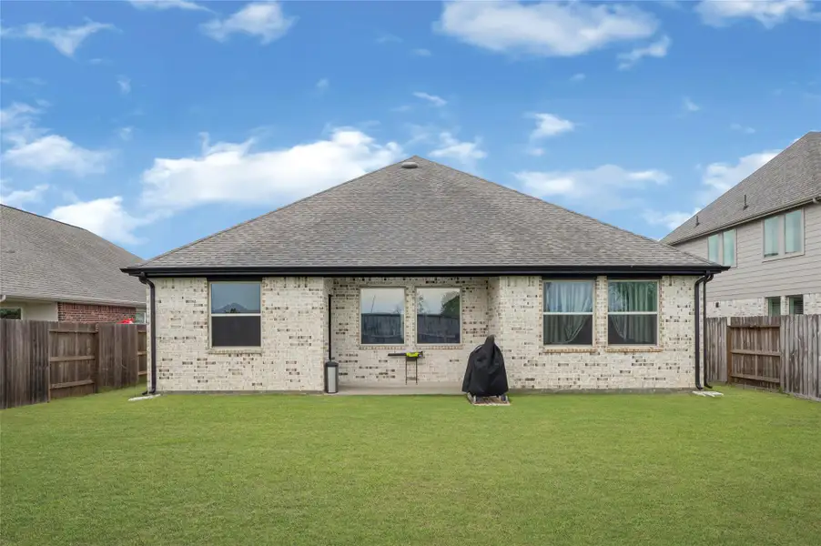 Exterior details and patio area of a home in Oakwood Estates, Waller (Image 23). Exterior details and patio area of a home in Oakwood Estates, Waller (Image 23).