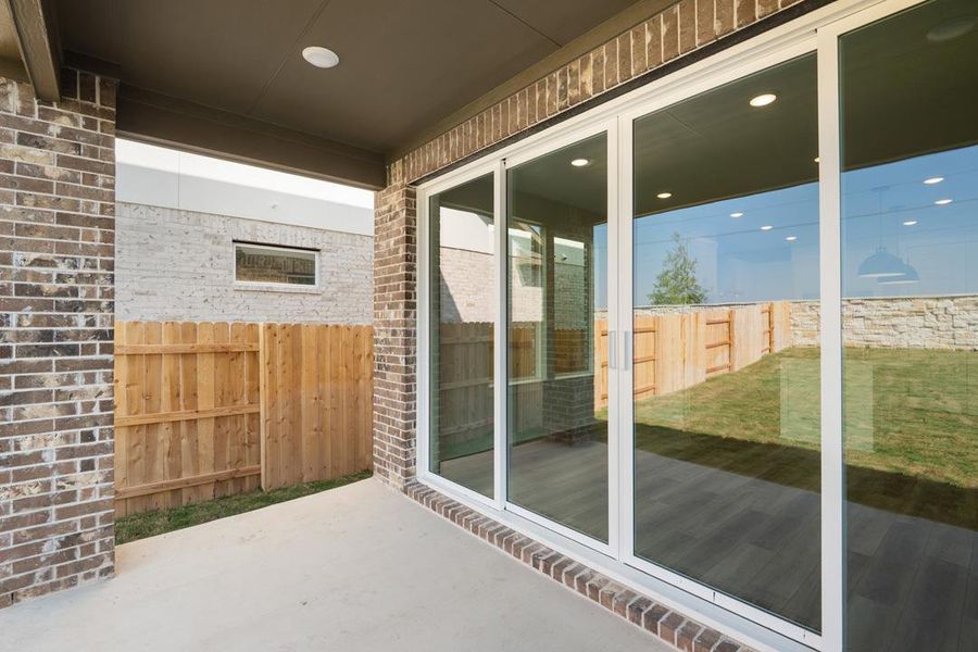 Exterior details and patio area of a home in Flora, Hutto (Image 18).