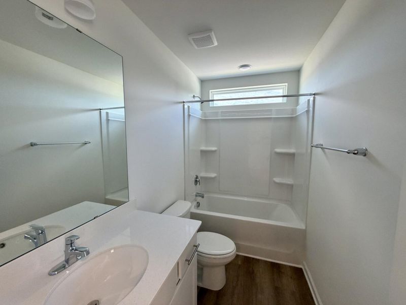 Furnished interior view inside a new home in Bellevue Townhomes, Greenville (Image 7).