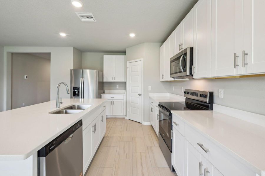 Furnished interior view inside a new home in Hampton Park - Classic Series, Vero Beach (Image 11).