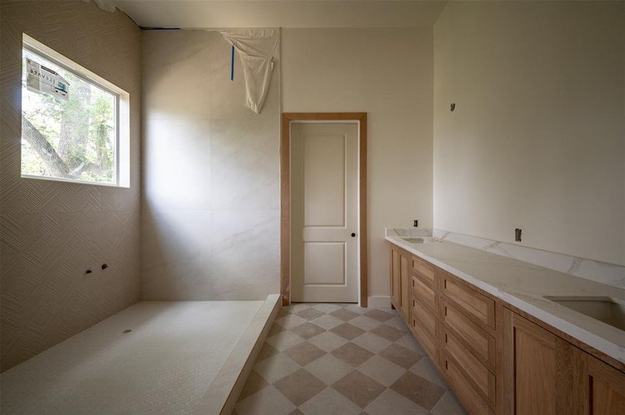 This bathroom has been meticulously crafted with trending soft neutral colors.