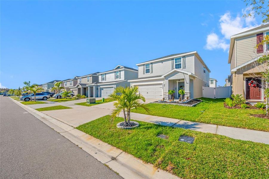 Front exterior of a new home in , Riverview, FL, highlighting curb appeal (Image 25). Front exterior of a new home in , Riverview, FL, highlighting curb appeal (Image 25).