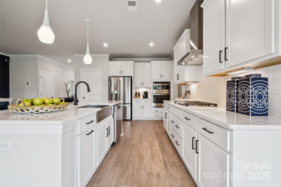 Example Photo Example Photo