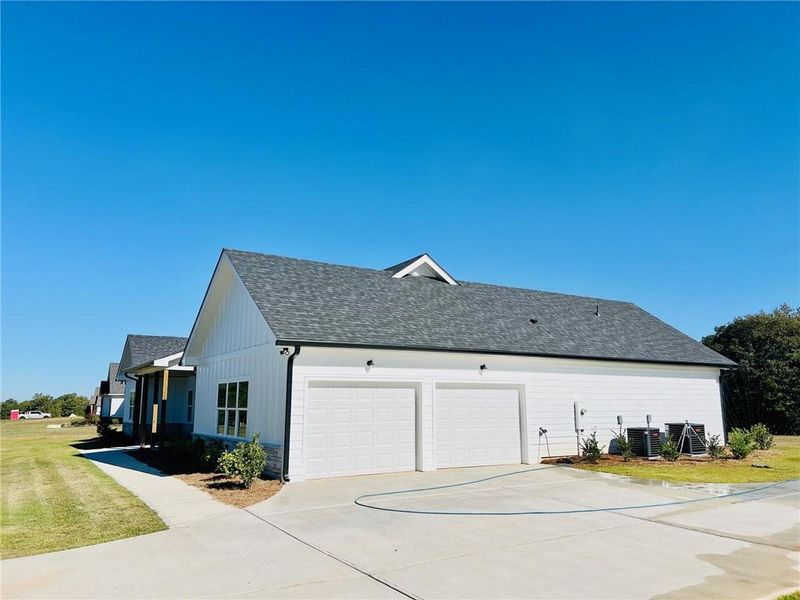 Front exterior of a new home in , Cartersville, GA, highlighting curb appeal (Image 1). Front exterior of a new home in , Cartersville, GA, highlighting curb appeal (Image 1).