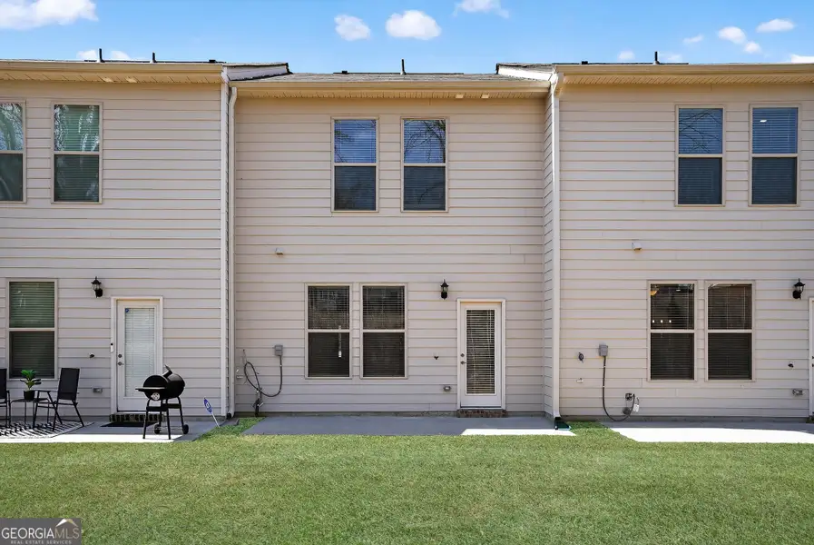 Exterior details and patio area of a home in Morning Creek Forest, Atlanta (Image 2). Exterior details and patio area of a home in Morning Creek Forest, Atlanta (Image 2).