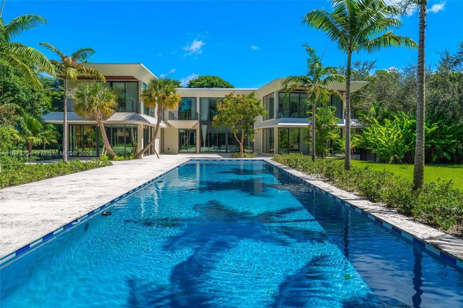 Front exterior of a new home in , Coral Gables, FL, highlighting curb appeal (Image 20).