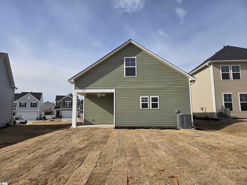Exterior details and patio area of a home in Halton Oaks, Spartanburg (Image 19).