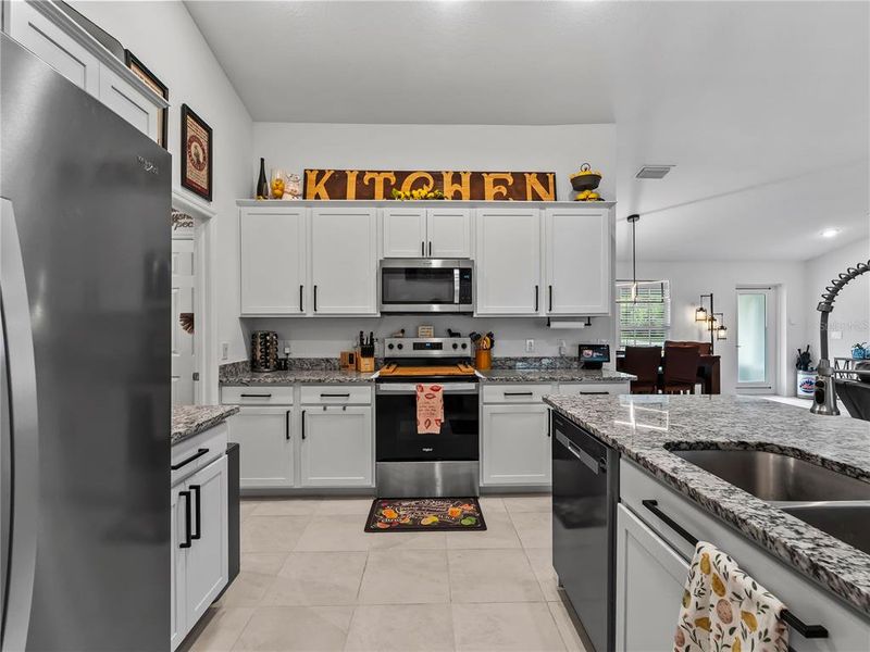 Furnished interior view inside a new home in , Port Charlotte (Image 48).