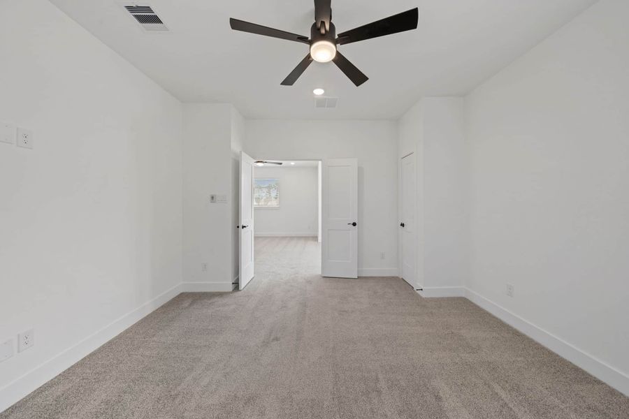 Representative unfurnished interior of a home built from the Waterloo – 60′ Lot by Chesmar Homes in Lakes of Cane Island, Katy (Image 22).