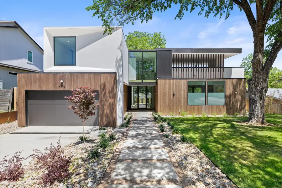 Front exterior of a new home in , Austin, TX, highlighting curb appeal (Image 1). Front exterior of a new home in , Austin, TX, highlighting curb appeal (Image 1).