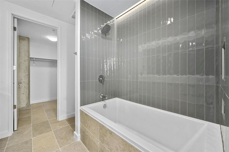 The second bathroom also features both a bathtub and a shower, offering versatility and convenience. The second bathroom also features both a bathtub and a shower, offering versatility and convenience.