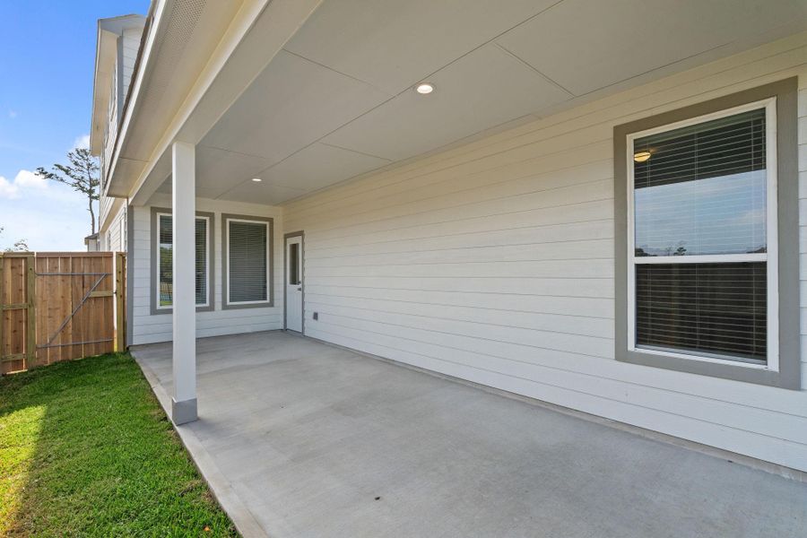 Exterior details and patio area of a home in Cypresswood Landing, Humble (Image 3).