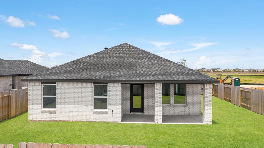 Exterior details and patio area of a home in Sunterra Lakes, Brookshire (Image 2). Exterior details and patio area of a home in Sunterra Lakes, Brookshire (Image 2).