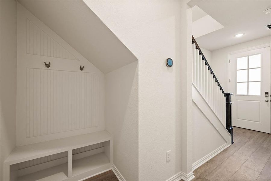 Mudroom with light wood-type flooring