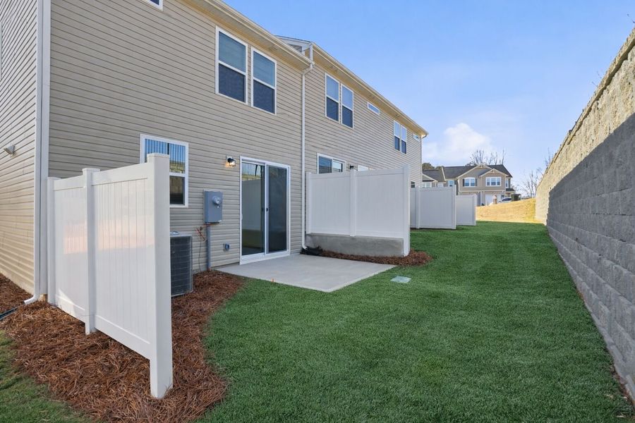Exterior details and patio area of a home in Hedgecliff Townes, Kannapolis (Image 15).