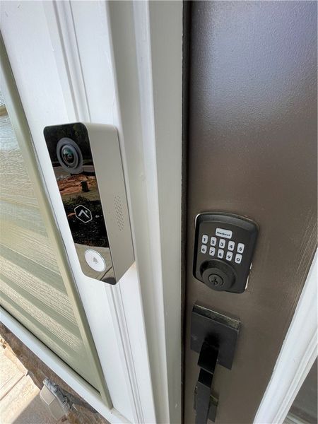 Secure entry point with a smart lock and doorbell.