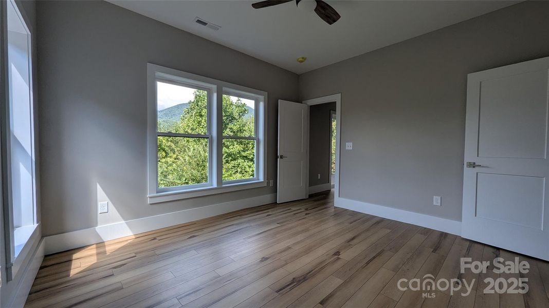 Spacious, unfurnished interior of a new home in , Waynesville (Image 9).
