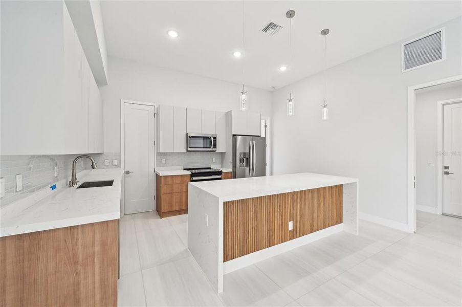 Furnished interior view inside a new home in , Port Charlotte (Image 10).