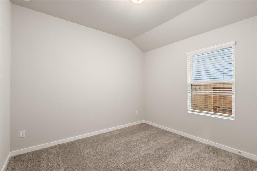 An additional view of the Stunning Secondary bedroom which features plush carpet, oversized window and walk-in closet.