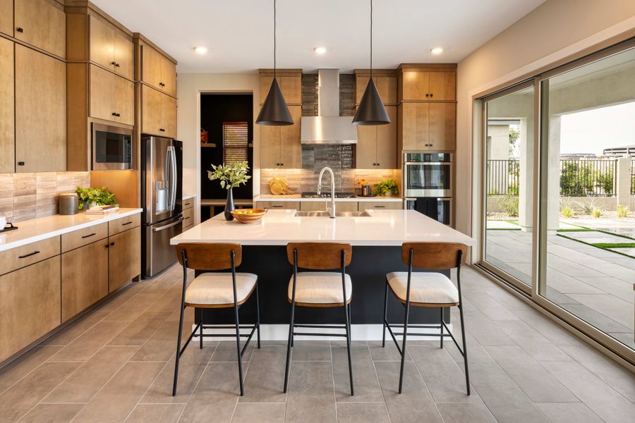 Representative furnished interior of a home built from the Willow Plan 40-9 by Tri Pointe Homes in Waterston Central, Gilbert (Image 9).