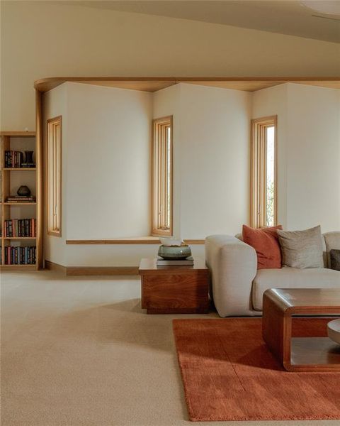 Living area with carpet flooring