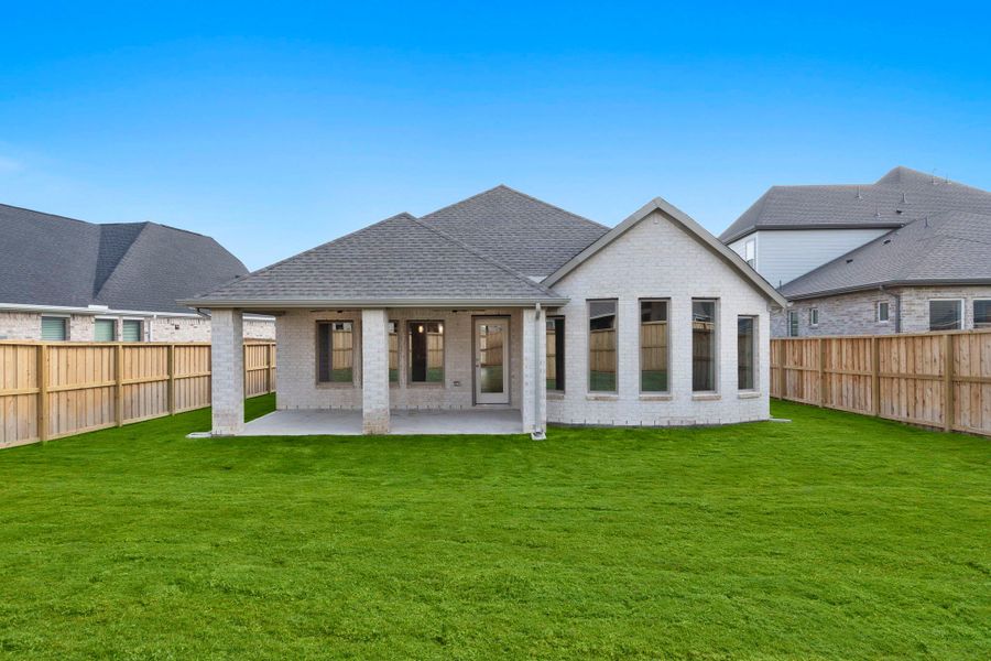Exterior details and patio area of a home in Dunham Pointe 50', Cypress (Image 22).