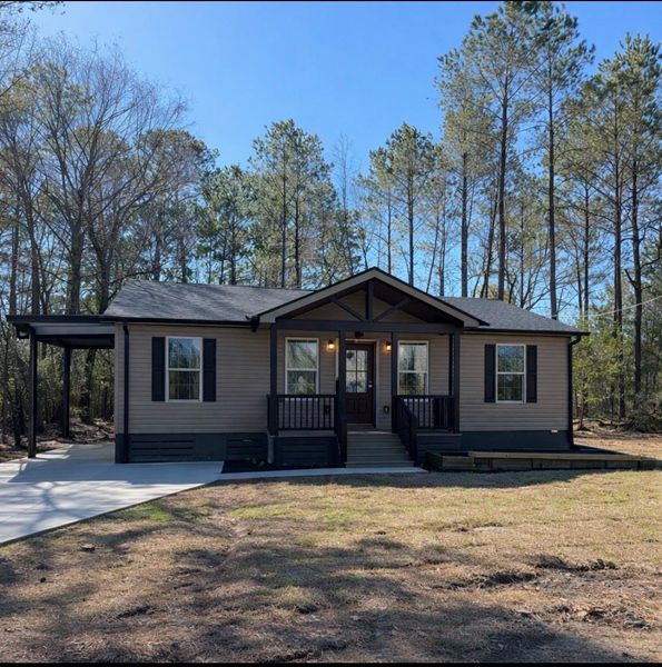 Exterior details and patio area of a home in , Plantersville (Image 18). Exterior details and patio area of a home in , Plantersville (Image 18).