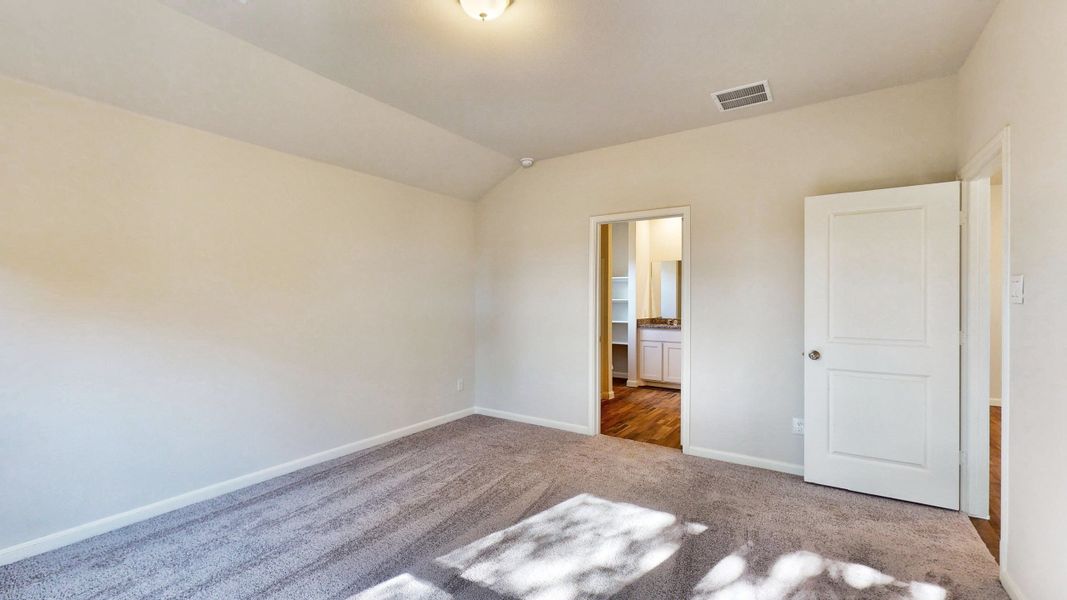 A hallway with white doors. A hallway with white doors.