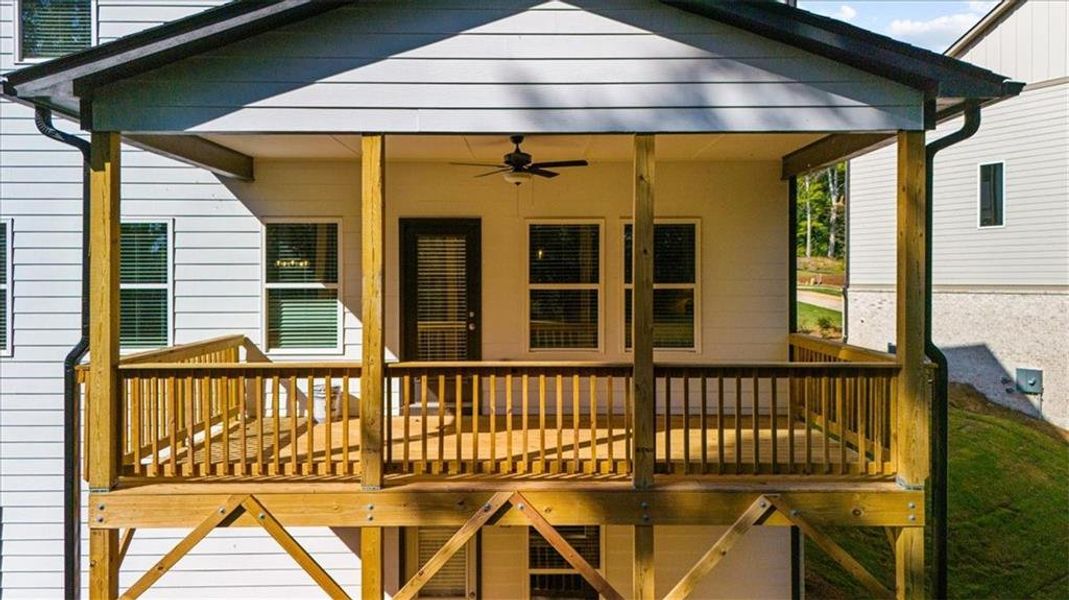 Front exterior of a new home in River Rock, Ball Ground, GA, highlighting curb appeal (Image 2).