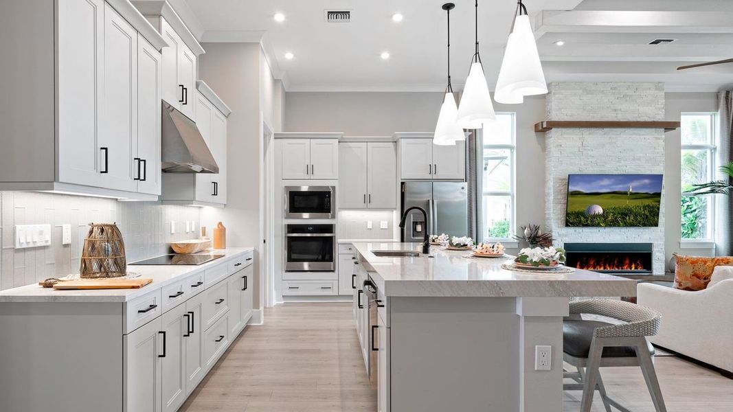 Lila Model Home | Kitchen and Great Room | Photo from sister community