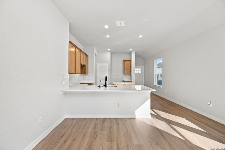 Furnished interior view inside a new home in Red Hawk Landing, San Antonio (Image 9).