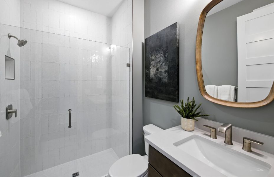 Representative furnished interior of a home built from the Coral by DiVosta in The Reserve at Eastpointe, Palm Beach Gardens (Image 9).