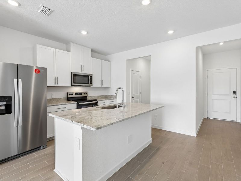 Furnished interior view inside a new home in The District at Oakleaf - The Commons, Middleburg (Image 5).
