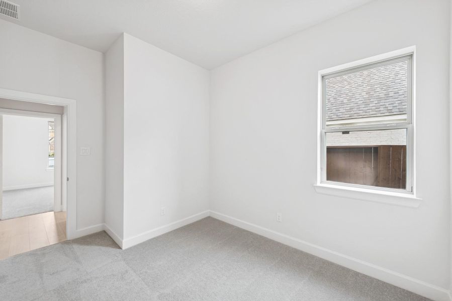 Spacious, unfurnished interior of a new home in Meridiana 55' Homesites, Manvel (Image 17). Spacious, unfurnished interior of a new home in Meridiana 55' Homesites, Manvel (Image 17).